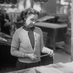 A market trader accepting a card payment at a stall